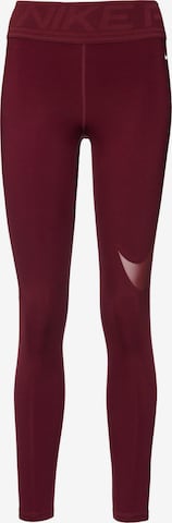 NIKE Skinny Workout Pants in Red: front