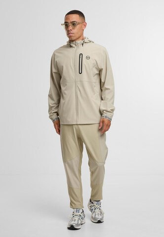 Sergio Tacchini Tapered Urheiluhousut 'Pelle' värissä harmaa