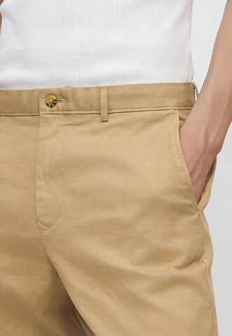 smėlio TOMMY HILFIGER Standartinis „Chino“ stiliaus kelnės 'DOVER'