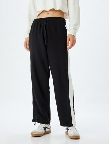 Koton Loose fit Trousers in Black: front