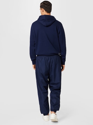 Lacoste Sport Tapered Workout Pants in Blue