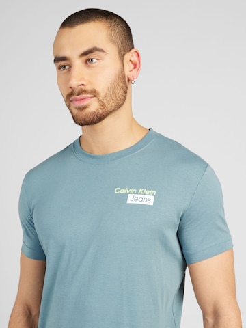 Calvin Klein Jeans T-shirt 'STACKED BOX' i blå