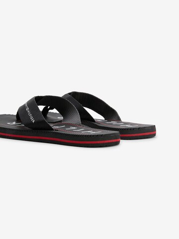 TOMMY HILFIGER Teenslippers in Zwart