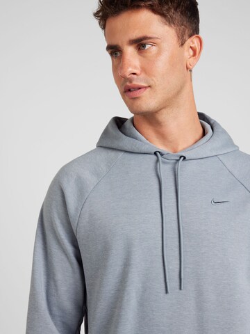 NIKE Sportovní mikina 'PRIMARY' – šedá