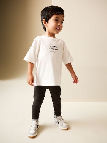 Next Set in Zwart: voorkant