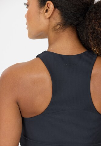 Athlecia Sports top 'Colbie' in Blue