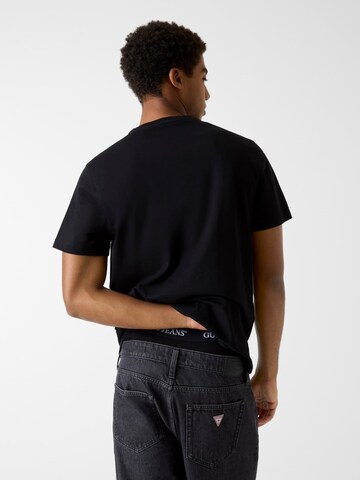 GUESS T-Shirt in Schwarz