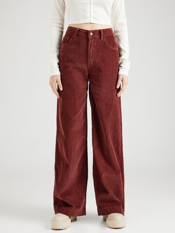 florence by mills exclusive for ABOUT YOU Wide leg Trousers 'Poinsettia' in Brown: front