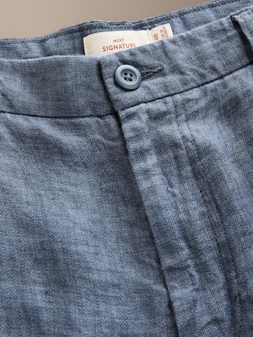Next Loosefit Bandplooibroek 'Signature' in Blauw