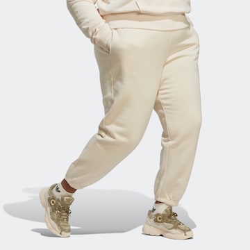 ADIDAS ORIGINALS Tapered Pants in Beige: front