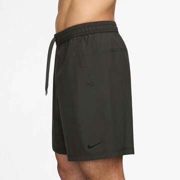 NIKE Regular Workout Pants in Green