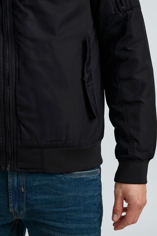 Veste mi-saison 'Martins' 11 Project en noir