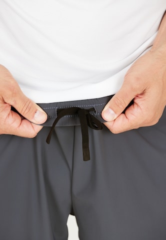 ENDURANCE Regular Workout Pants 'Dyne' in Blue