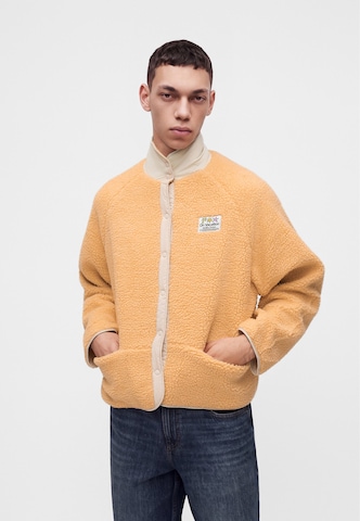 Veste en polaire 'Holiday Service' On Vacation en orange : devant