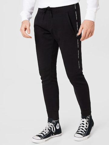 Calvin Klein Jeans Tapered Hose in Schwarz: predná strana