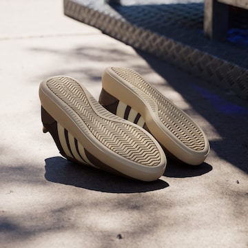 Baskets basses 'Barreda Decode' ADIDAS SPORTSWEAR en marron