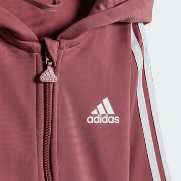 ADIDAS SPORTSWEAR Tracksuit 'ESSENTIALS SHINY' in Red