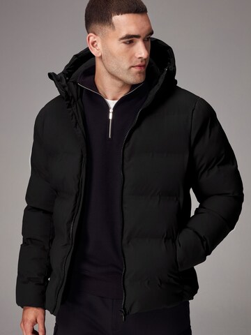 Next Vinterparkas i svart