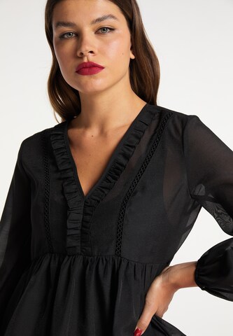 Camicia da donna di faina in nero