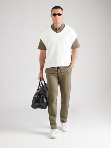 Lindbergh Slimfit Chinohousut 'Superflex' värissä vihreä