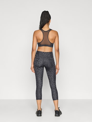 PUMA Skinny Παντελόνι φόρμας 'Essential' σε μαύρο