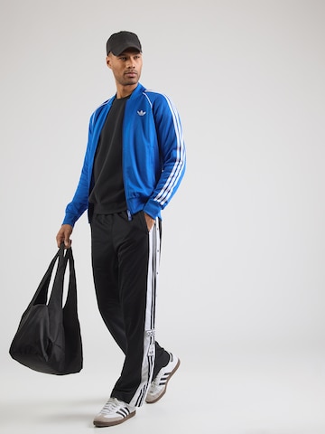 ADIDAS ORIGINALS Jopa na zadrgo 'SST' | modra barva