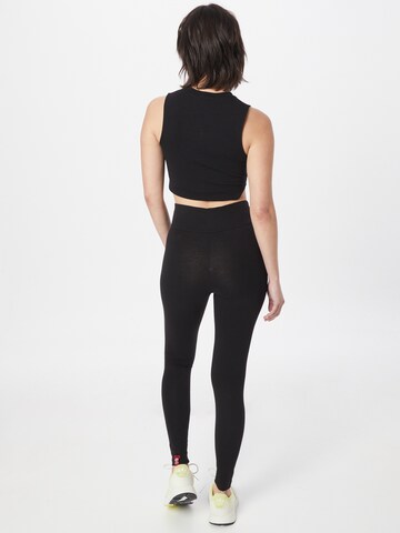 ALPHA INDUSTRIES - Skinny Leggings em preto