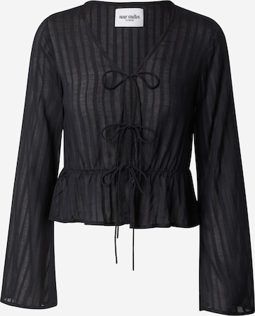 noar studios Blus i svart: framsida