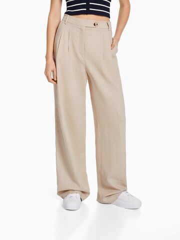 Loosefit Pantalon à plis Bershka en beige : devant