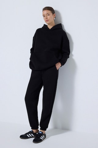 Touche Prive Jogginganzug in Schwarz