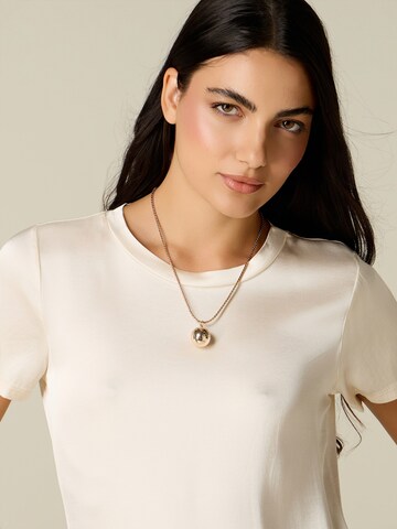 T-shirt oltre en blanc