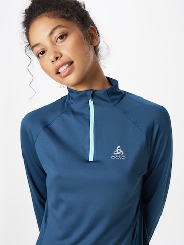 ODLO Sportshirt 'Essential' in Blau