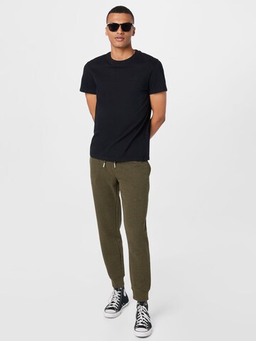 Tapered Pantaloni di Superdry in verde