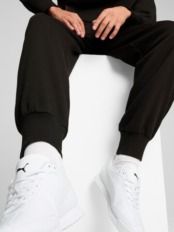 PUMA Tapered Sports trousers 'BMW ESS+' in Black