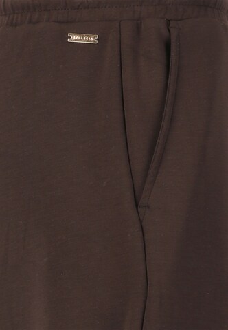 Athlecia Regular Sporthose 'Jacey' in Braun