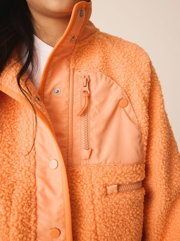 Giacca di pile di Next in arancione