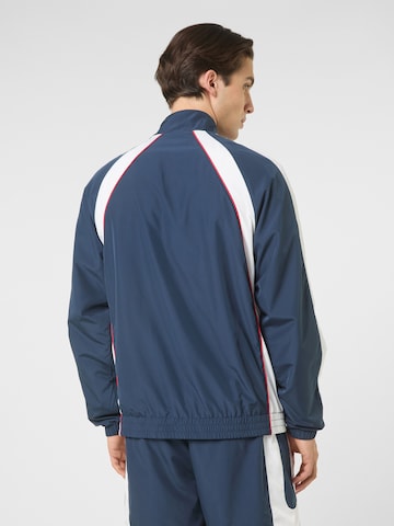 FILA - Sudadera con cremallera 'PISTOIA relaxed  blocked woven track jacket' en azul