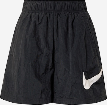 Nike Sportswear Wide leg Pants in Black: front