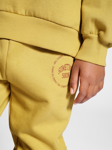 Tapered Pantaloni 'Luna' di SOMETIME SOON in giallo
