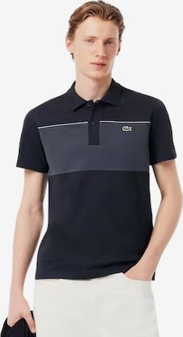 LACOSTE - Camiseta 'Polo lacoste negro regular fit colour block shirt' en negro: frente