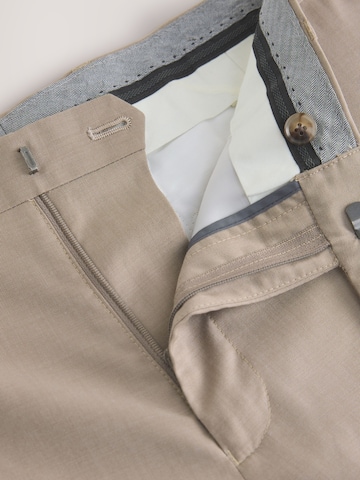Coupe slim Pantalon à plis Next en beige