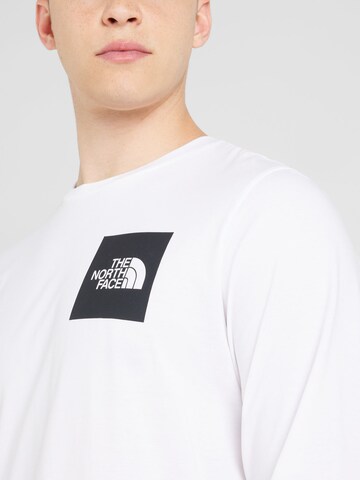THE NORTH FACE Футболка в Белый
