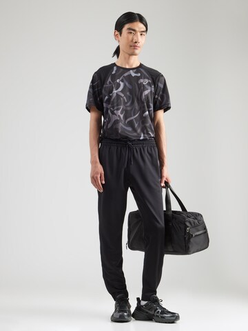 BJÖRN BORG Tapered Sportbroek 'ESSENTIAL' in Zwart