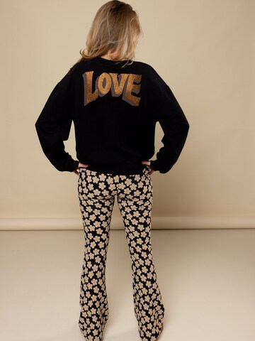 Sweat-shirt Looxs Revolution en noir