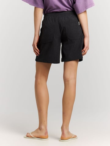 Regular Pantalon 'Natty' PROTEST en noir