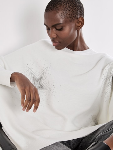 Pull-over ' ' Apricot en blanc