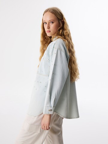 Veste mi-saison Twist en bleu