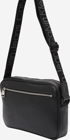 Sac à bandoulière Calvin Klein Jeans en noir