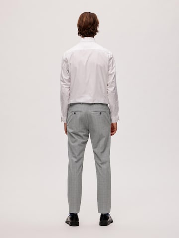 Coupe slim Pantalon à plis 'Ross' SELECTED HOMME en gris