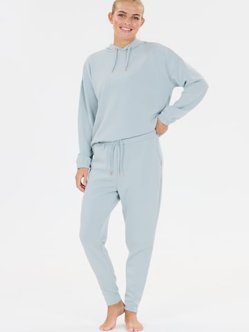 Athlecia - Tapered Pantalón deportivo 'Jacey' en azul